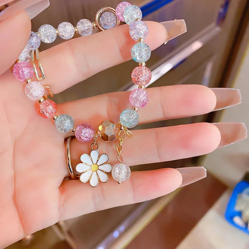 ¡𝐔𝐋𝐓𝐈𝐌𝐀 𝐓𝐄𝐍𝐃𝐄𝐍𝐂𝐈𝐀! Pulsera Colorida con Dije de Margarita 🌼