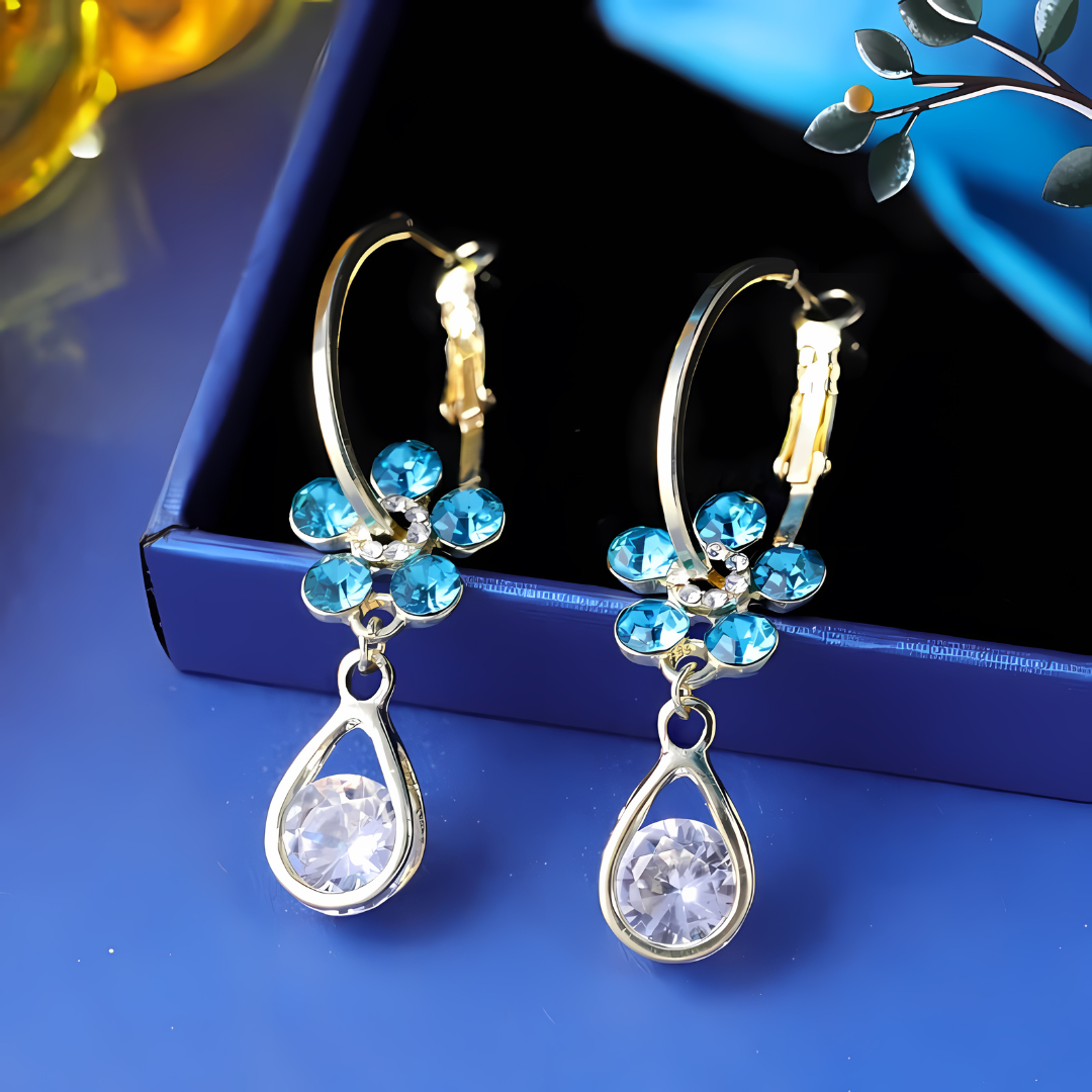 ¡𝐄𝐋 𝐑𝐄𝐆𝐀𝐋𝐎 𝐈𝐃𝐄𝐀𝐋! Aretes de Gota con Flor de Cristal Azul y Zirconia - Joyería de Lujo ¡Ideal para Regalos! 💠